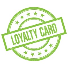 LOYALTY CARD text written on green vintage stamp.