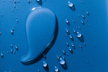 Large and small water droplets viewed from above