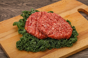 Raw beef burger cutlet for cooking