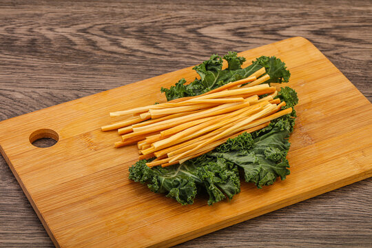 Chechel cheese sticks over board