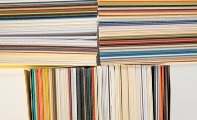 Sheets of colored paper on white background