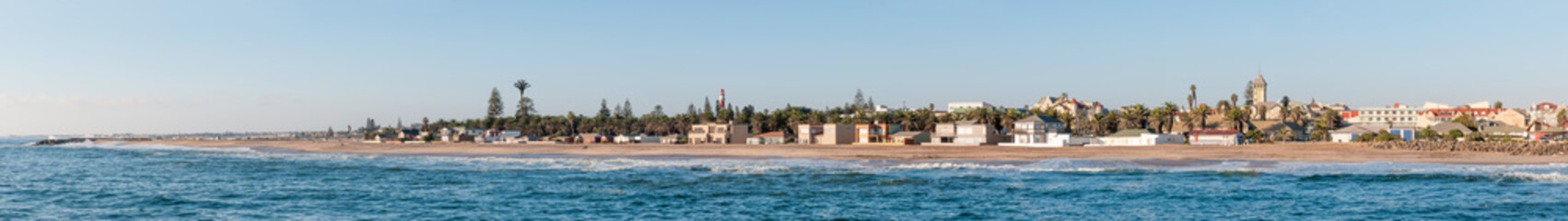 Fototapeta na wymiar Beach scene, as seen from the historic jetty, in Swakopmund