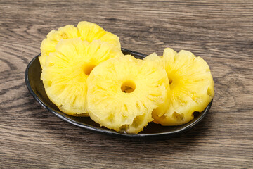 Sweet pineapple rings in the bowl