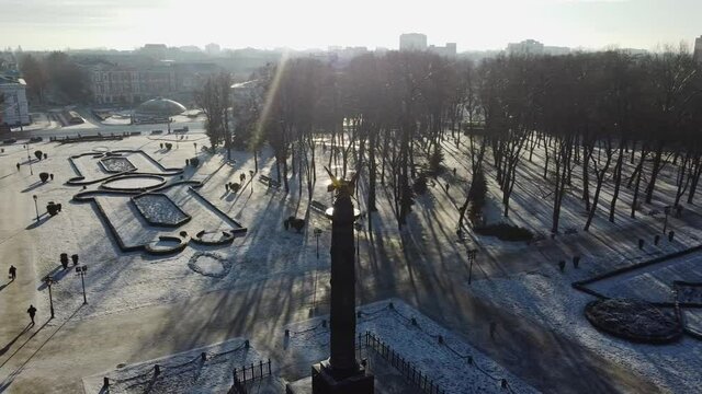Aerial drone video fo glory statue of golden eagle in city centre of Poltava 