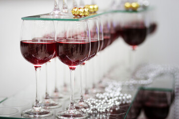 many glasses of red wine. Luxury table for a Banquet. Table set for a party