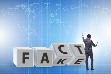 Face or fact concept with turning cubes