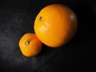 
orange and tangerine on black background
