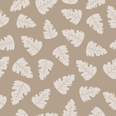 Light flat tropical leaves on beige background. Seamless floral pattern. Suitable for wrapping paper, wallpaper.