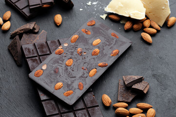Raw chocolate bars with nuts. chocolate background