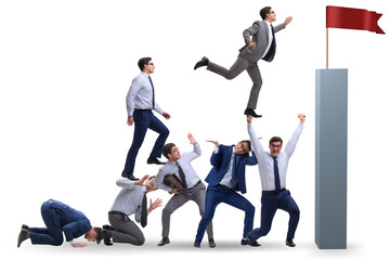 Career progression concept with businessman climbing stairs