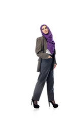 Successful. Modern arab woman in stylish office attire isolated on studio background with copyspace for ad. Fashion, beauty, style concept. Female model with trendy make up, manicure and accessories.