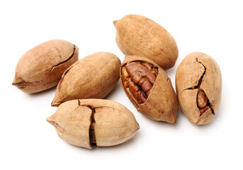 Peeled pecan nuts closeup, isolated on white background