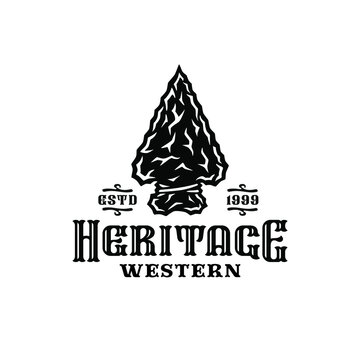 Monochrome wild west label with flint arrowhead in vintage style isolated vector illustration
