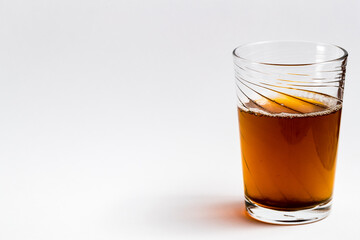 moroccan tea glass on white background with copy space