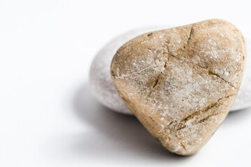 heart shaped stone on white background