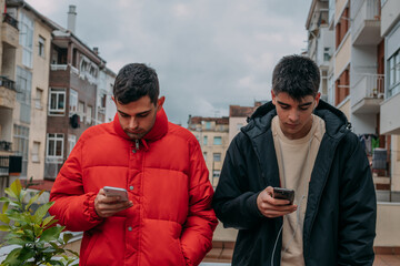 young people in the city with mobile phone outdoors