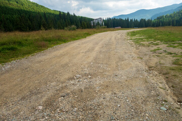 View from Bucegi mountains, Romania, Bucegi National Park; vegetation, dirt, roads, stone and nature elements