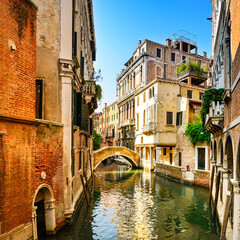 Venice cityscape, buildings, water canal and bridge. Italy