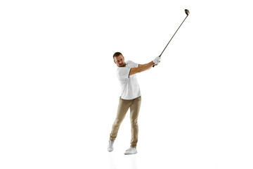 Passioned. Golf player in a white shirt taking a swing isolated on white studio background with copyspace. Professional player practicing with bright emotions and facial expression. Sport concept.