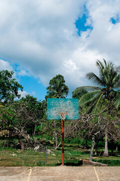 Basketball court between palm trees in the Philippines