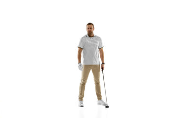 Naklejka premium Confidence. Golf player in a white shirt practicing, playing isolated on white studio background with copyspace. Professional player practicing with bright emotions and facial expression. Sport