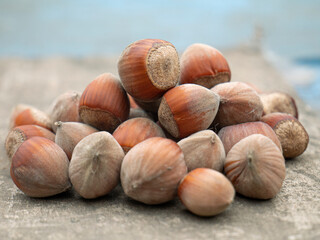 Hazelnut nut on wooden background