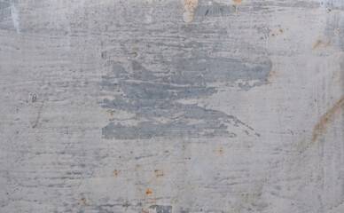 Textured concrete background. Old wall made of beige plaster. Metal surface, rust stains. Copy space. Attrition.