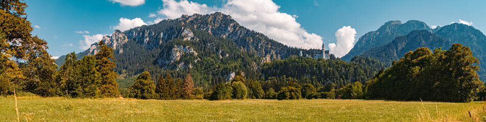 High resolution stitched panorama of a beautiful alpine summer view with the famous castle Neuschwanstein, Schwangau, Bavaria, Germany