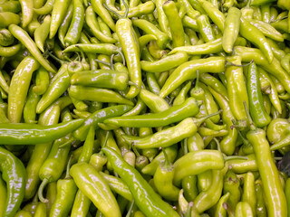 New harvest a group of organic green peppers at the market, this green peppers for stuffing, food economy and vegetable prices in the market