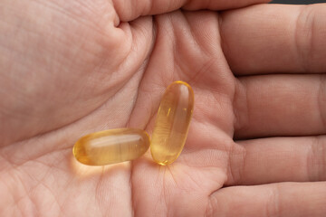 Soft Capsule Heap Back-lit omega 3 healthy diet concept