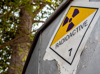 Radiation warning sign on the Dangerous goods transport label Class 7 at the side transport truck