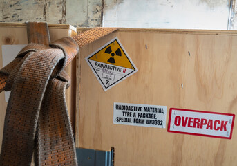 Radiation label beside the transport wooden box Type A package