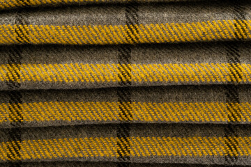 Woolen cloth, grey and yellow colors, pattern texture background