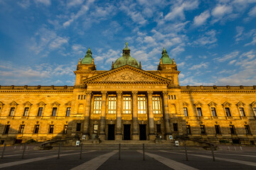 Fototapeta premium Sunrise at the federal high court building at the city of Leipzig. German federal court in downtown of Leipzig. In the time of the GDR, the Bundesverwaltungsgericht was the Georgi Dimitroff Museum.