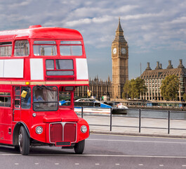 Big Ben with old red double decker bus in London, England, UK