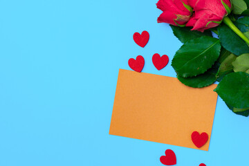 Bouquet of roses and envelope top view