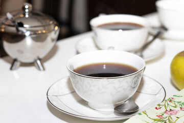 a cup of coffee on the table