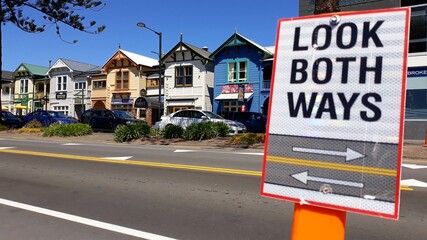 Art deco style architecture and the road sign in the foreground in Napier, New Zealand