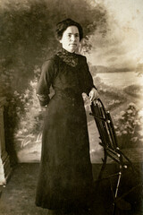 RUSSIA - CIRCA 1920s: Full body shot of mature women in studio Vintage Carte de Viste Edwardian era...