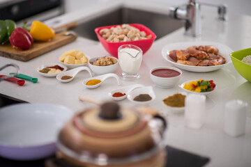Preparing food in modern white kitchen