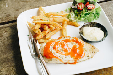 Grilled ckicken breast steak with potato and vegetable