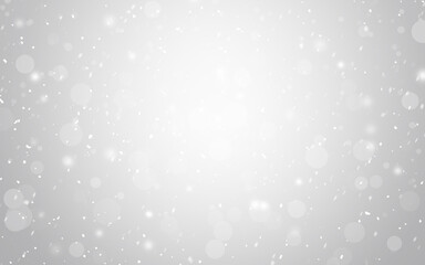 The bokeh on the background blurred gray and white. Bokeh colorful glows sparkle beautiful Christmas background concept. New year day