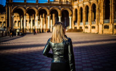 Woman walking around Spain Square in Seville - Andalusia, Spain