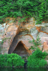 Cave in sandstone on riverside