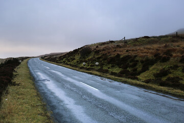 Narrow road on the Isle of Skye in Scotland