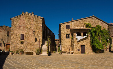 Historic stone residential buildings in the village of Montemerano near Manciano in Grosseto...