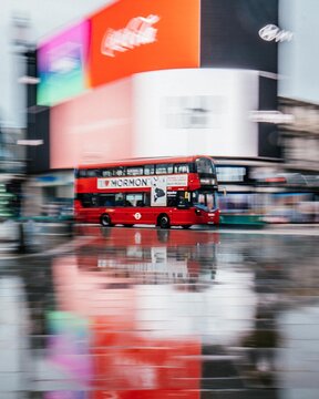 Public Transportation red bus at Picadilly Circus, London, United Kingdom