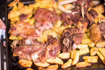 Chicken with potatoes closeup