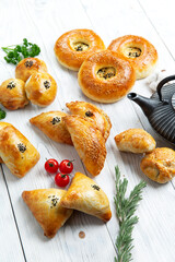 Top view of assorted oriental baked meat pies. samsa.