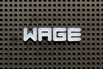 White color letter in word wage on black pegboard background